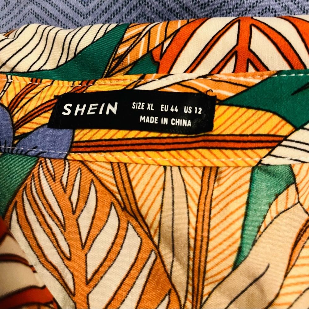 Three piece tropical set from SHEIN: button down blouse, tube top & shorts.